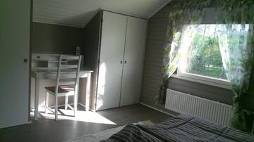Фото номера Двухместный номер с 2 отдельными кроватями и общей ванной комнатой Гостевой дом Metsäniityn Tuvat г. Billnäs 12